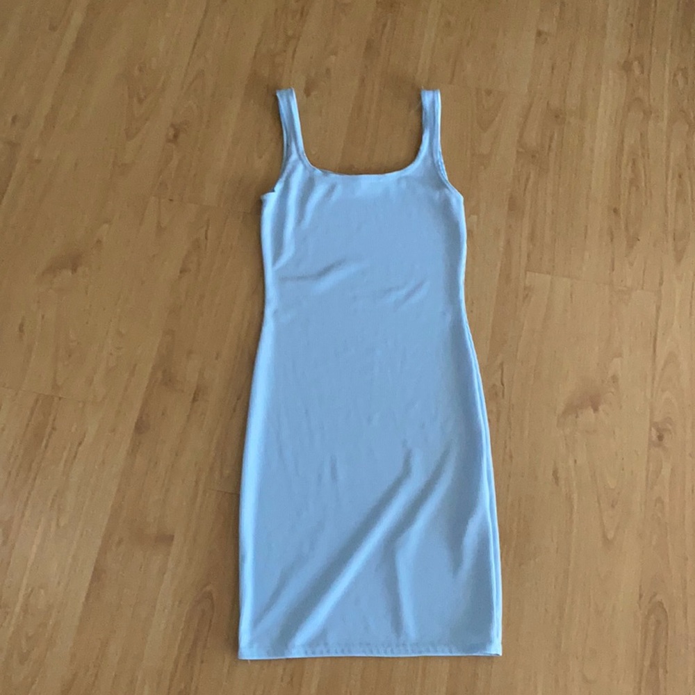 Light blue bodycon dress.